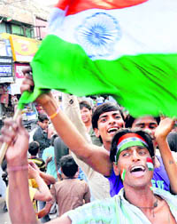 Fans celebrate Indian teams victory over Sri Lanka in the World Cup final