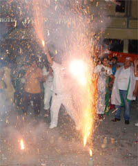 Residents burst crackers to celebrate Indias win in the cricket World Cup, on the Amrik Singh Road in Bathinda late on Saturday evening.