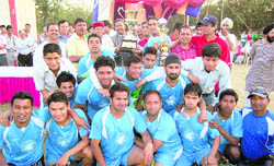 The Doon Star team poses after winning the Vir Singh Thakur Memorial Tournament in Dehradun on Sunday.