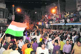 Residents of Karnal celebrate after the Indian team defeated Sri Lanka to lift the Cricket World Cup, 2011, on Saturday