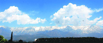 A view of the Dhauladhars in Kangra district.