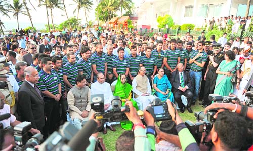 The Indian cricket team poses for a group photo with President Pratibha Patil during a tea party at the Governor's House in Mumbai on Sunday