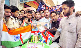 Cricket fans celebrate Indias victory a day after the Men in Blue defeated Sri Lanka in the World Cup final, in Amritsar on Sunday.
