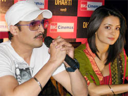 Jimmy Shergill and Surveen Chawla address the media during the promotion of their forthcoming Punjabi movie Dharti, at the Big Cinemas in Bathinda 