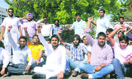 PUSU activists protest outside the Vice-Chancellors office at Panjab University on Monday.