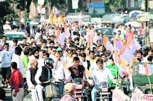 Traders take out rally in Dehradun on Monday.