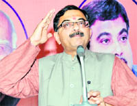 Rajya Sabha MP and national spokesperson of the BJP Tarun Vijay addresses a press conference in Dehradun on Monday. 