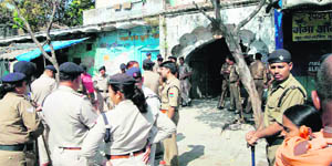 Police deployed outside the ashram in Haridwar on Monday.