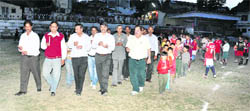 Residents of Kangra take out a candlelight procession to pay tributes to the victims of April 4, 1905, earthquake on Monday. 