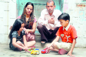 Tarori resident Hoshiar Singh settled for a bride from Himachal Pradesh. He and his wife, Sunita, look on as their two children play at their one-room home in the village.