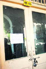 An MC building lies locked owing to the strike by the Joint Sangharsh Committee in Amritsar on Tuesday.