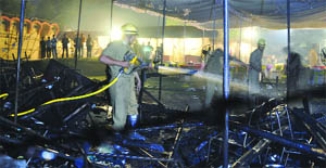 Ten stalls were gutted when a fire broke out at Indira Gandhi National Centre for Arts in New Delhi on Tuesday where an exhibition on Northeast India was on.