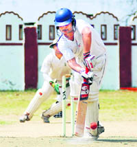 A batsman in action in the District Cricket League played at Survey of India Stadium in Dehradun on Tuesday