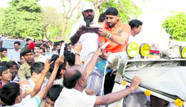 Harbhajan Singh gives autographs to fans at the BSF Punjab Frontier Headquarters in Jalandhar on Tuesday.