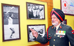 Olympian Col Balbir Singh (retd), who is writing his autobiography, poses in uniform at the newly constructed Hall of Fame at his house in Jalandhar. 