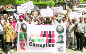 Social activists take out a march against corruption to express solidarity with Anna Hazare in Ludhiana on Tuesday.