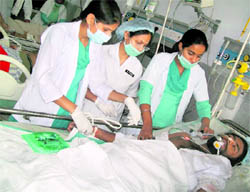 A man, who fell ill after having langar in a village near Jaito, undergoes treatment at Guru Gobind Singh Medical College and Hospital in Faridkot on Tuesday.