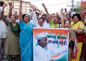 Volunteers of NGOs raise slogans in support of social activist Anna Hazares demand for a stronger Lokpal Bill, in Bathinda on Wednesday. 