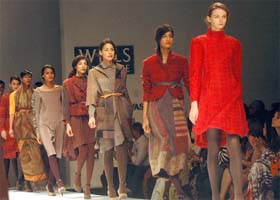 Models showcase the creation of designer Neeru Kumar on the first day of Wills Lifestyle India Fashion Week at Pragati Maidan in New Delhi