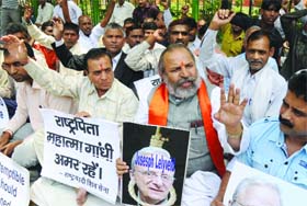 Activists of the Rashtrawadi Shiv Sena hold a protest against writer Joseph Leyveld who has written against Mahatama Gandhi in his book at Jantar Mantar in New Delhi