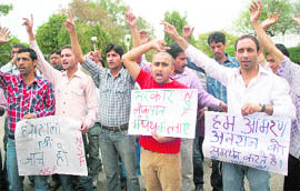 Activists of the National Secular Forum stage a protest in Jammu on Wednesday