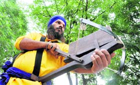 Sukhdev Singh with his kamaan