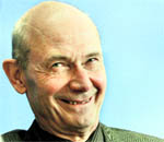 WTO Director-General Pascal Lamy smiles during a news conference at the World Trade Organization headquarters in Geneva on Thursday