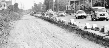 Road work has been discontinued due to want of raw material at the Phase 1 and 2 dividing road in Mohali. 
