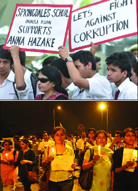 Schoolchildren come to support the campaign as some other supporters take out a candlelight march at the India Gate. 