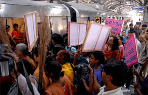 Local activists demonstrate against eve-teasing at Darodacharya Metro station in Gurgaon