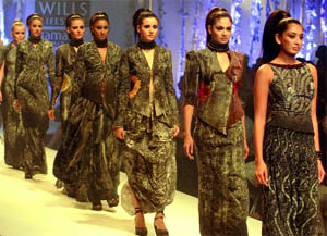 Models walk down the ramp to showcase the creation of designer Payal Jain during the 2nd day of Wills Lifestyle India Fashion Week at Pragati Maidan in New Delhi on Thursday.