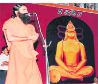 Yoga guru Swami Ramdev addresses a gathering in Haridwar