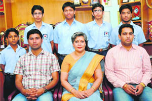 Students of Dyal Singh Public School, sector 7, who were selected in the sports and physical aptitude test conducted by the Haryana Government with their principal Nina Rai (centre) in Karnal.