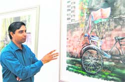 Bheem Mahajan exhibits his paintings at Thakur Singh Art Gallery in Amritsar. 