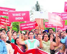 Dr Navjot Kaur, wife of MP Navjot Sidhu, leads a march in support of Anna Hazares crusade against corruption at Hall Gate in Amritsar on Friday