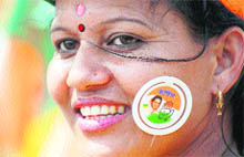 A supporter during Congress chief Sonia Gandhi's rally at Khanapara in Guwahati on Friday