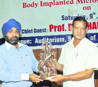 Vice-Chancellor, Uttaranchal College of Technology and Bi-Medical Science, Dr CS Mehta being felicitated at a seminar in Dehradun on Saturday. 