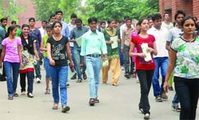 Students come out after appearing for IIT-JEE Examination at Modern School in New Delhi on Sunday