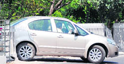  A car passing through a broken divider on the Ferozepur road