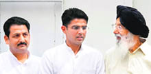Sachin Pilot (centre), Union Minister of State for Communications and Technology, along with Chief Minister Parkash Singh Badal, during a programme at Jalandhar on Sunday. 