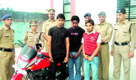 Three accused who were involved in multiple cases of snatching in police custody in Haridwar on Monday.