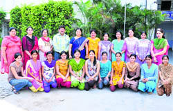 A group photo of meritorious students of GVM Girls College with principal Jyoti Juneja and other teachers of the college. 