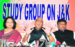 (Centre) Rajnath Singh, former national president of the BJP, addresses a press conference in Jammu on Monday. 