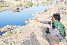 NOT A BREATHER: Garbage dumps and effluents from industry flows freely in Budda Nullah near Gurunanak Pura in Ludhiana