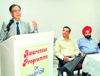 Former Indian High Commissioner to Pakistan Satish Chandra speaks at a seminar in Amritsar. 