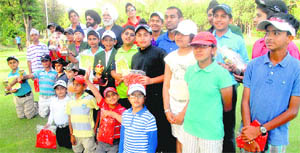 Winners and runners-up of the Baisakhi Junior Golf Tournament and merit list toppers of Golf Mission 2016 at the Chandigarh Golf Club on Tuesday. 