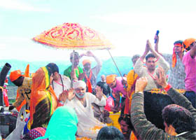 Devotees of Sai Baba during a procession in Shimla on Tuesday.