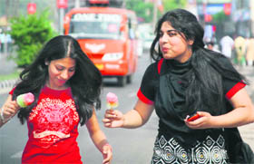 These girls seem to be making the most of a hot afternoon in Jammu.