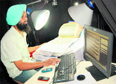 Digitisation work in progress at the Sikh Reference Library in Amritsar.