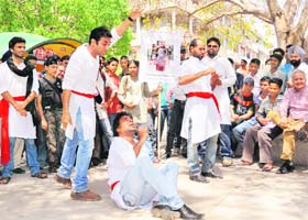 Artistes stage a street play “Towa” in Sector 17, Chandigarh, on Wednesday